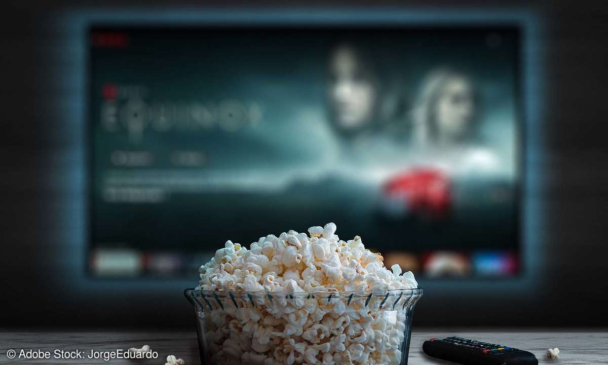 A bowl of popcorn in front of a TV showing the Netflix original series Equinox