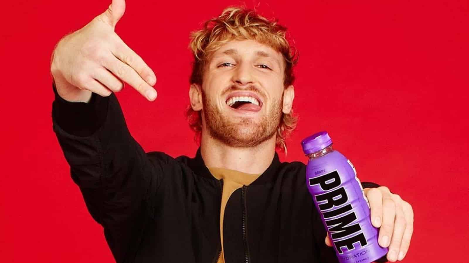 Logan Paul holds a Prime drink