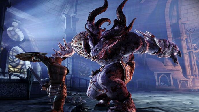 The Gray Warden in Dragon Age: Origins fights a giant darkspawn ogre