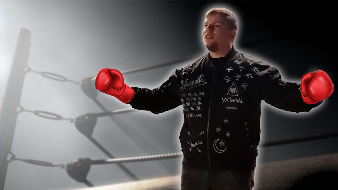 Twitch streamer ban dancing in a boxing ring wearing boxing gloves