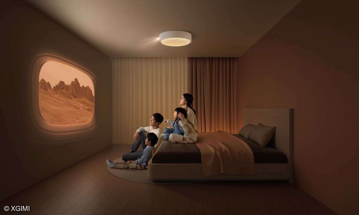 Practical: a home cinema projector that can also be used as a ceiling lamp.