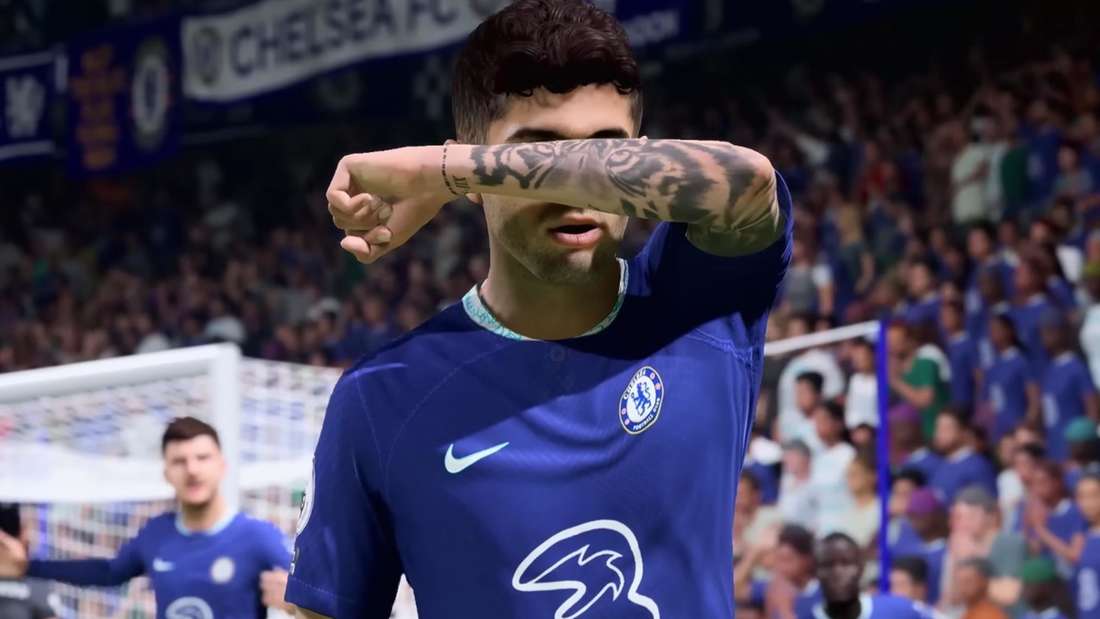 FIFA player holds his arm in front of his face