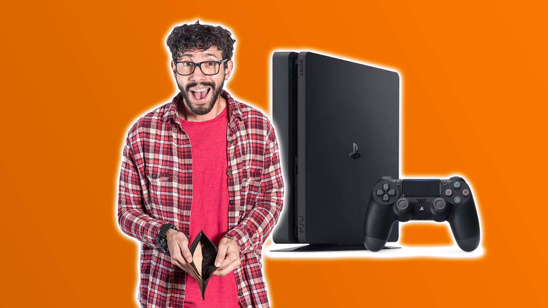 A man holds an empty wallet next to a PS4
