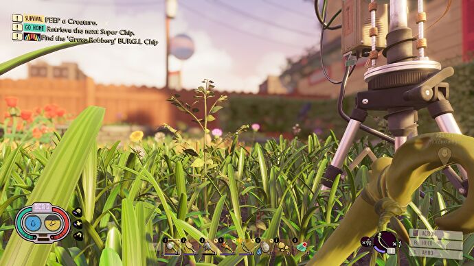 Grounded player staring out over blades of grass, with a large scientific tripod device looming over on the right.