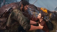 Scene from the video game The Last of Us.  Joel grabs Ellie.