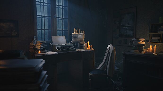 A dimly candlelit room with a typewriter on a desk under the windows.  It's dusk outside and a nearby chair has a shawl or blanket draped over it.  The room is very cluttered with books, papers, and pictures on the walls.  An unlit oil lamp sits on the table.
